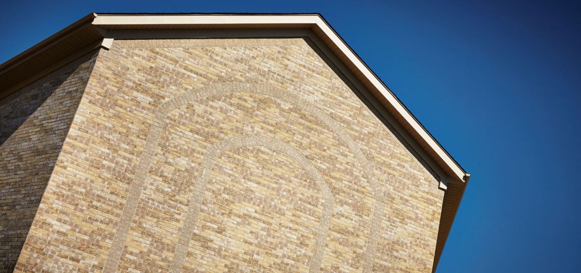 Masonry work with unique brick patterns for a local church institution.